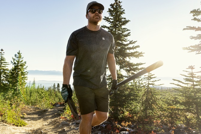 A person holding a baseball bat

Description automatically generated with medium confidence
