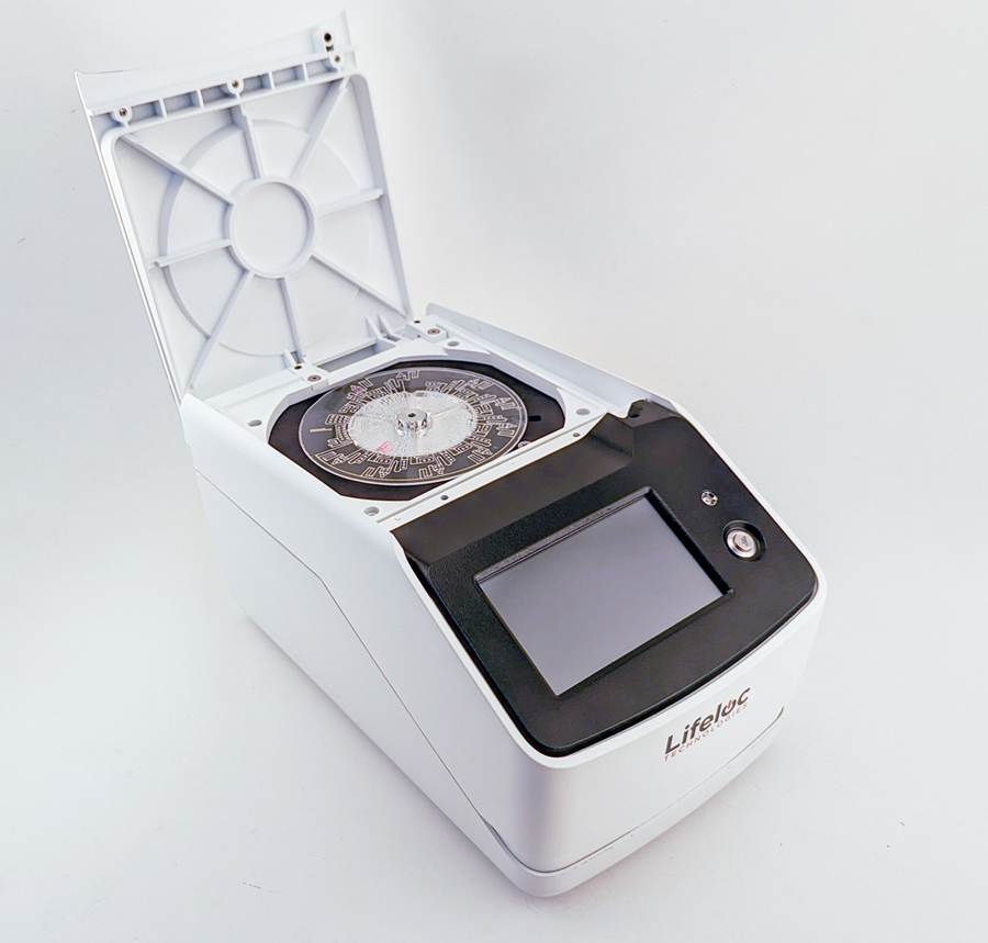 A white and black device with a screen

AI-generated content may be incorrect.