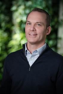 A person in a blue sweater

AI-generated content may be incorrect.