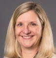 A close-up of a person smiling

Description automatically generated